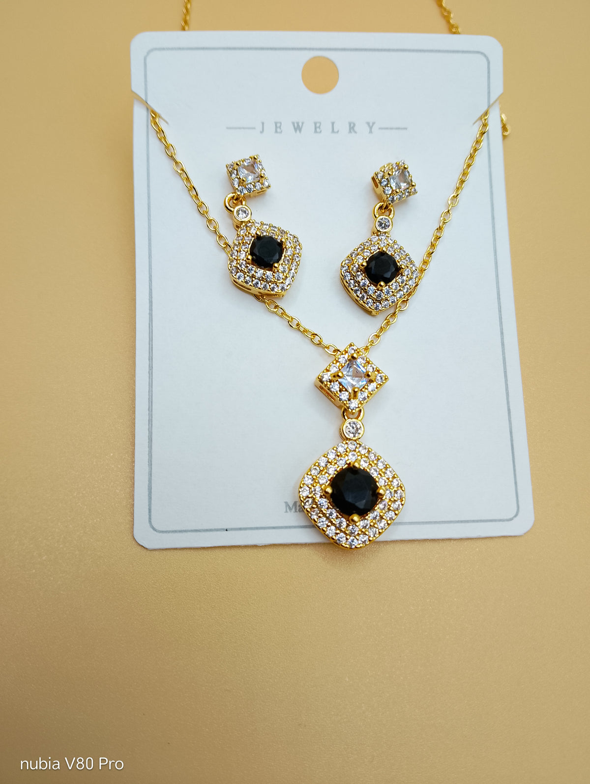 Noir Éclat Locket Set — Black & Gold Elegance
