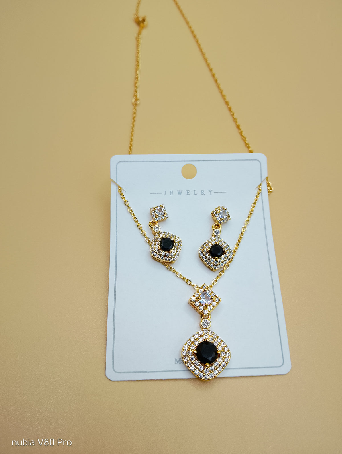 Noir Éclat Locket Set — Black & Gold Elegance