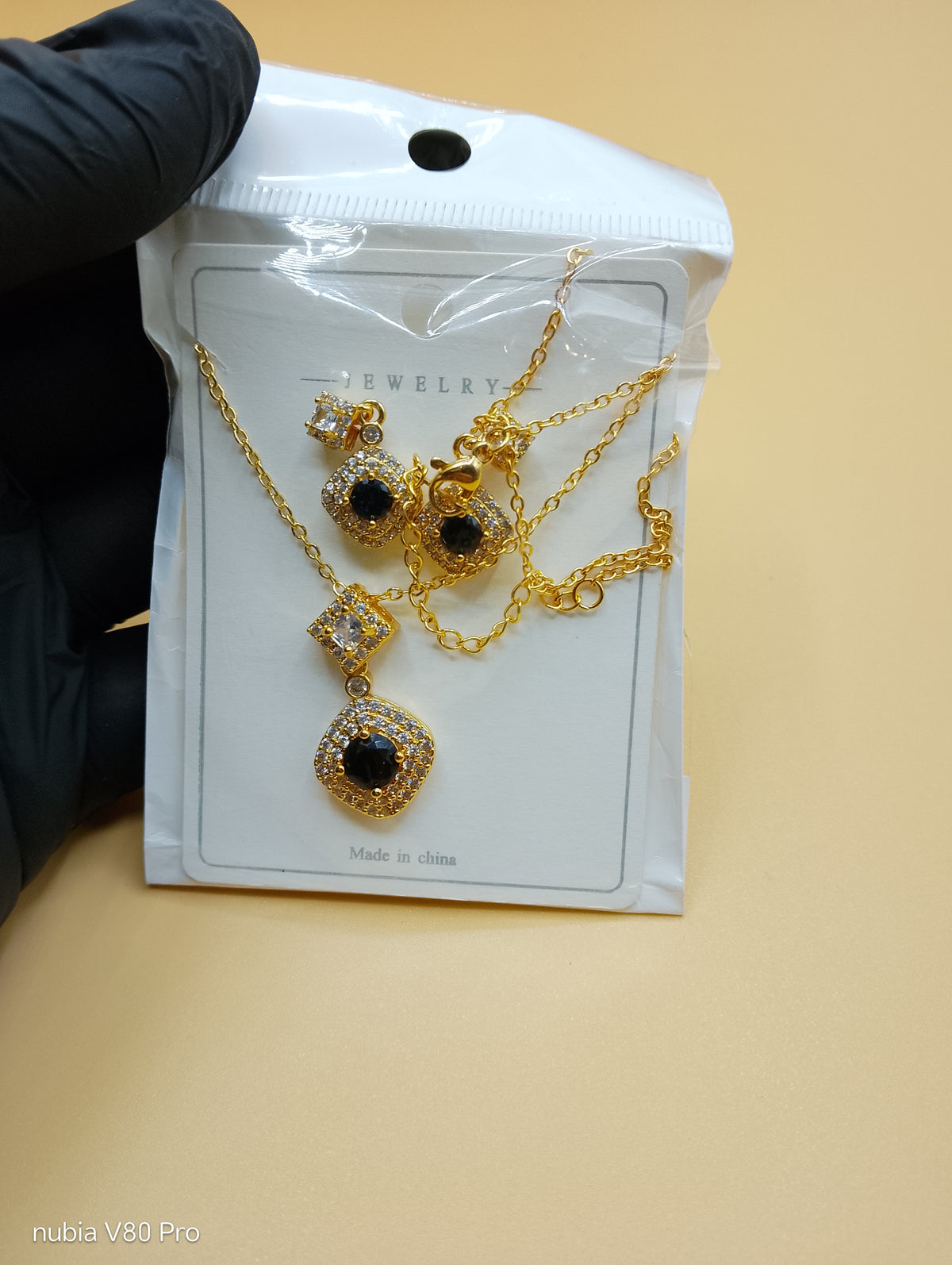Noir Éclat Locket Set — Black & Gold Elegance